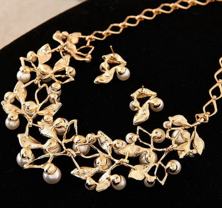 Gold leaf wedding jewelry set with faux-pearl drops, crystal leaves, necklace and earrings