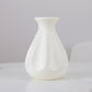 Milk white fluted teardrop vase, standing upright, 14 x 20 cm
