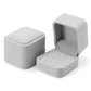 Flannel grey jewelry gift box set, one closed and one open with cushion