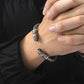 Wolf-head cuff bracelet on hand, antique silver plated, braided design