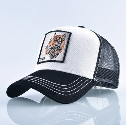 Embroidered animal baseball cap in white with black mesh and fox patch.