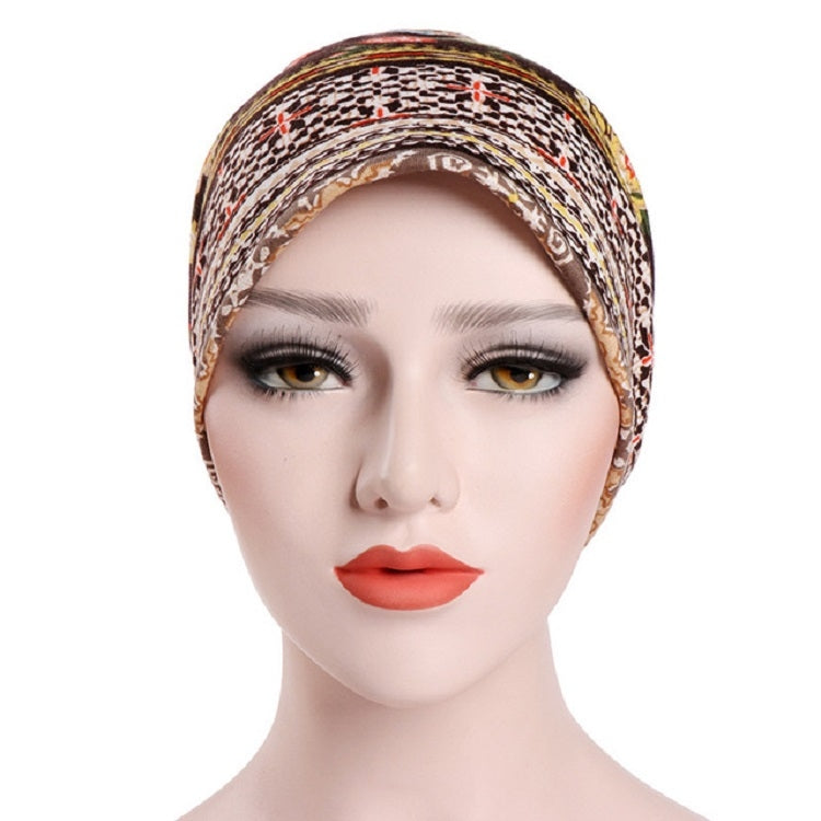 Brown patterned cotton headscarf wrap with multicolor print, worn on model