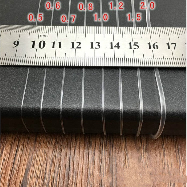 Ruler measuring transparent fishing line thickness (0.5–2.0 mm)