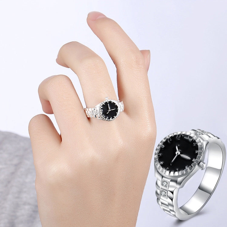 Silver-tone watch ring on hand, black dial with crystal bezel and metal links