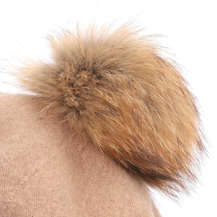 Brown faux-fur pom-pom detail for a plush beanie hat