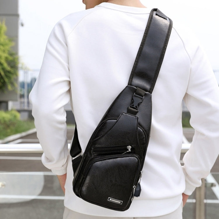 Men's black single-strap chest bag with front zip pocket and adjustable shoulder strap
