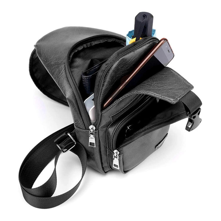 Men's black chest bag with open compartments and zippered front pocket for phone