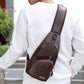 Men's brown chest bag with front dual zippers and crossbody strap for daily carry