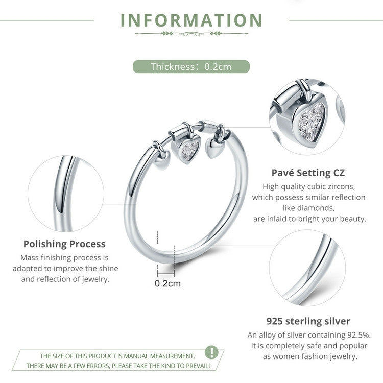 Sterling silver heart CZ ring with three heart settings and bow accents