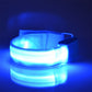 Light blue glowing LED light armband bracelet on an adjustable strap