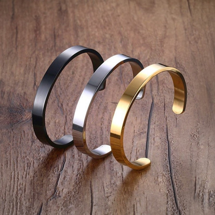 Stainless steel cuff bangles set in black, silver, and gold with open ends