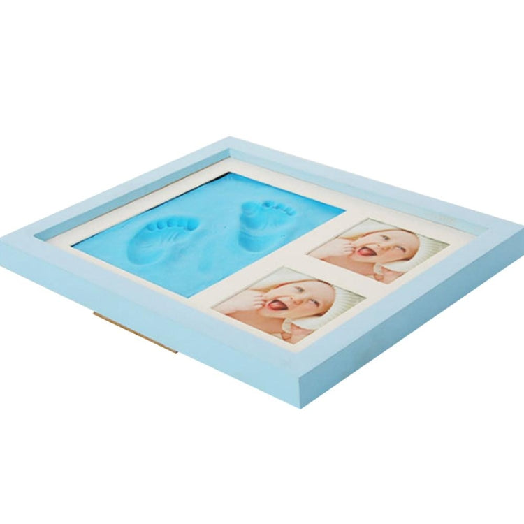Light wood baby hand and foot print photo frame with cover, blue imprint and two photos