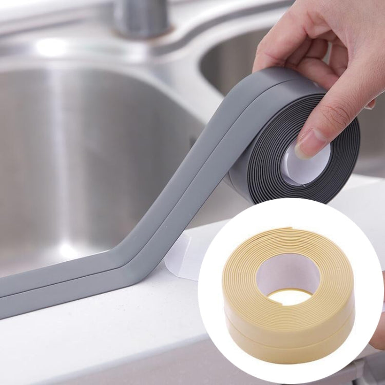 Grey waterproof adhesive sealing tape application, with beige tape roll inset