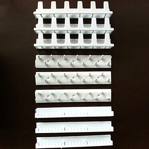 White adhesive jewelry hook rails with metal pegs, stacked wall mount set
