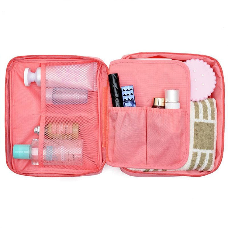 Two-piece coral and pink zippered toiletry bags, one open with mesh compartments.