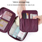 Burgundy zippered toiletry organizer bag open with mesh pocket and elastic slots.