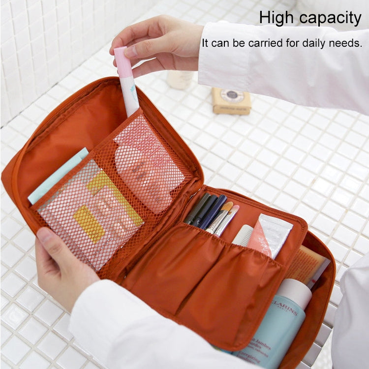 Orange zippered toiletry organizer bag open with mesh section and elastic brush holders.