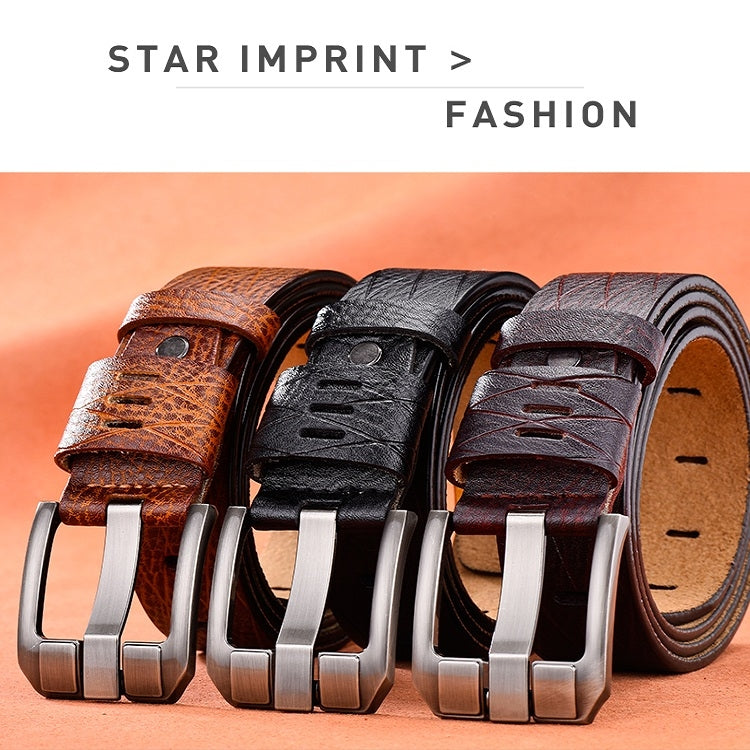 Set of textured leather belts with silver buckles in brown and dark tones