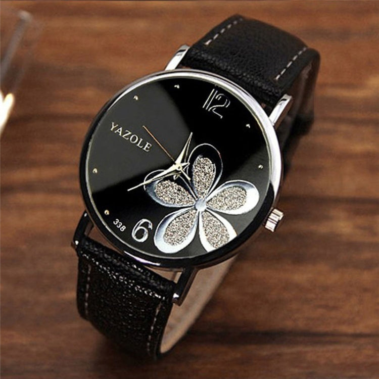 Ladies quartz watch with black leather strap and silver bezel, black dial with glitter four-leaf clover