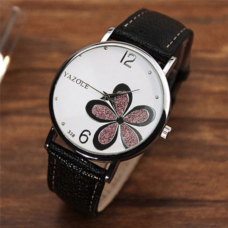 Ladies quartz watch with black leather strap, silver case, white dial with glitter four-leaf clover
