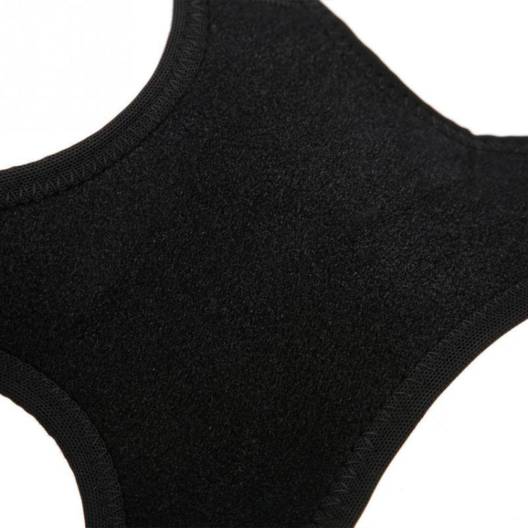 Black textured fabric pad of posture corrector belt with breathable mesh backing