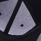 Black baseball cap interior triangular panel with mesh lining detail