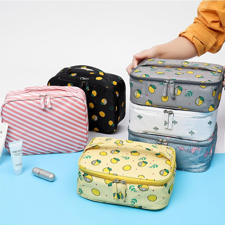 Set of portable makeup bags in black, pink stripes, gray lemon, and yellow patterns