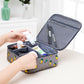 Dark blue cosmetic bag with lemon print, open top mesh pocket, and divider compartments