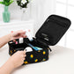 Black makeup bag with lemon print, open mesh pocket and zippered compartments