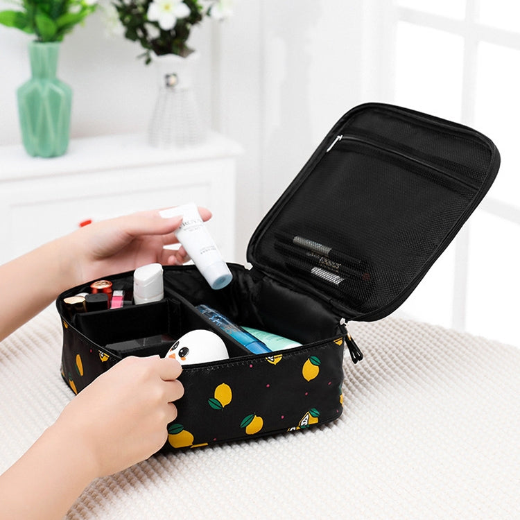 Black makeup bag with lemon print, open mesh pocket and zippered compartments