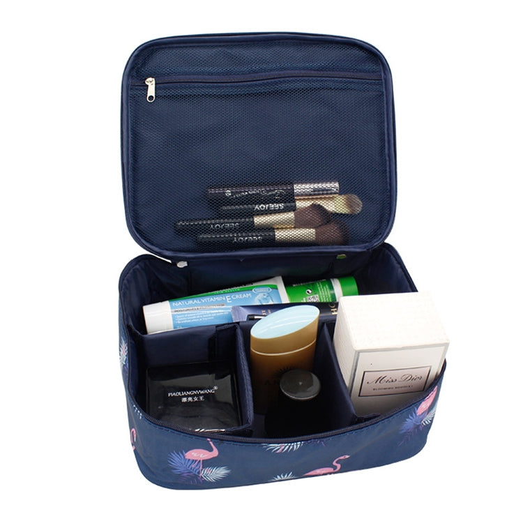 Navy waterproof padded cosmetic bag with zip closure, interior compartments for beauty products.