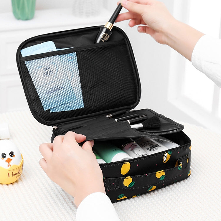 Black waterproof padded cosmetic bag with zip top, open compartments for makeup brushes and items.