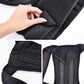 Black adjustable back brace with wide hook-and-loop straps and padded breathable fabric