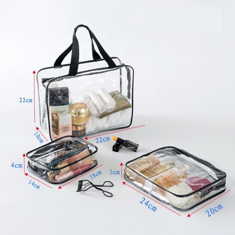 Clear PVC toiletry organizer bag with black handles and zipper, multiple compartments