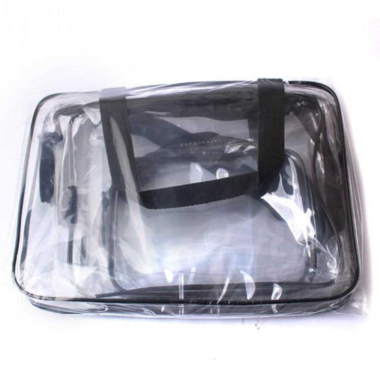 Large clear PVC travel bag with black top handle and zipper closure