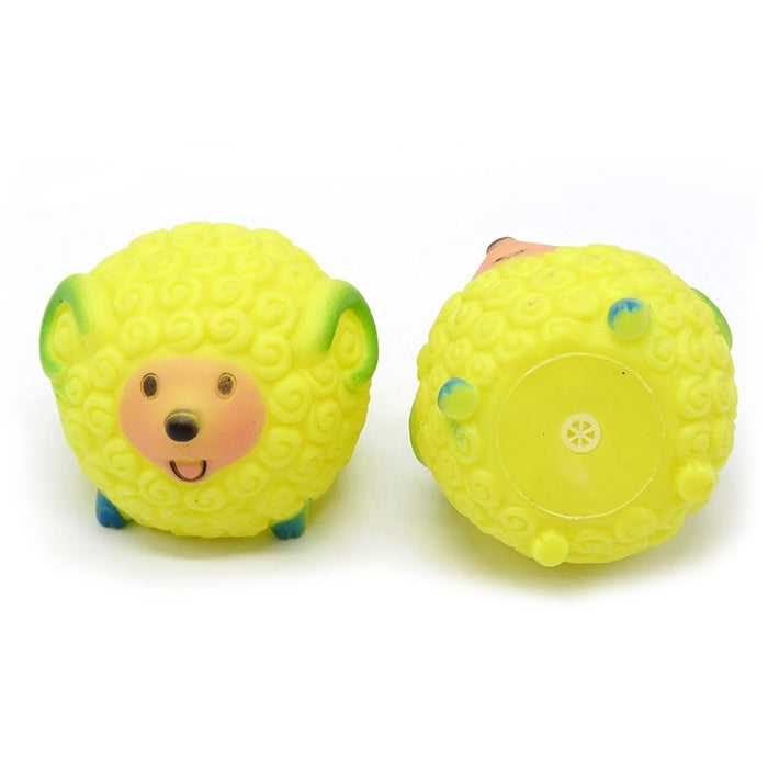 Two rubber squeaky ball toys with cartoon bear faces in yellow-green and light green