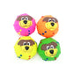 Set of four rubber squeaky ball toys with cartoon lion faces in pink, orange, yellow, and green