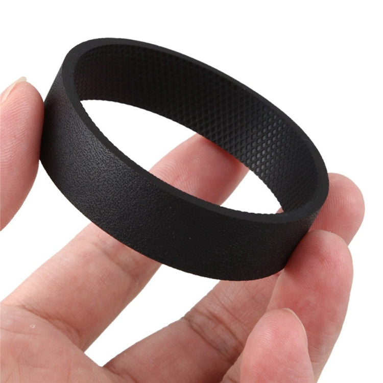 Black textured vacuum drive belt loop held in hands
