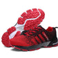 Red and black trekking sneakers with white side stripe and red treaded outsole