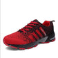 Red knit-style trekking sneakers with red laces, black heel panel, gripped outsole