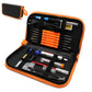 Electric soldering iron kit in orange zippered case with iron and orange tip holder