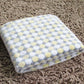 Flannel pet blanket with pastel yellow dot pattern, soft fuzzy top, folded edge
