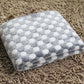 Flannel pet blanket with light gray and white dot pattern, soft fuzzy top, folded