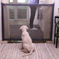 Portable folding pet fence gate with beige mesh panels and dark frame, pet containment
