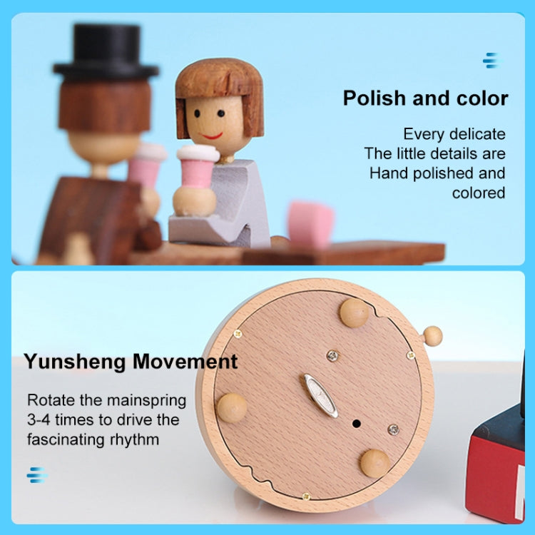 Wooden rotating music box detail with figures and round motion plate, hand-polished wood