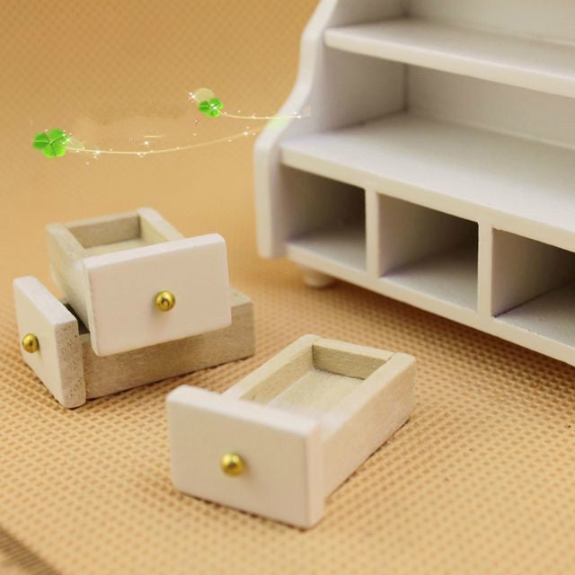 White mini cabinet shelf unit with side drawers and open cubby compartments