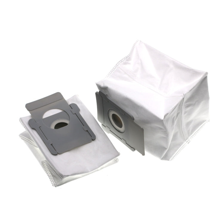 Robot vacuum dust bags with gray holders and white fabric bags