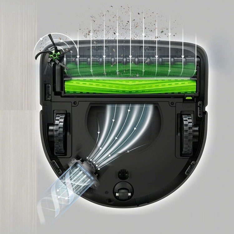 Robot vacuum brush module inside housing with green roller and side bristle brushes