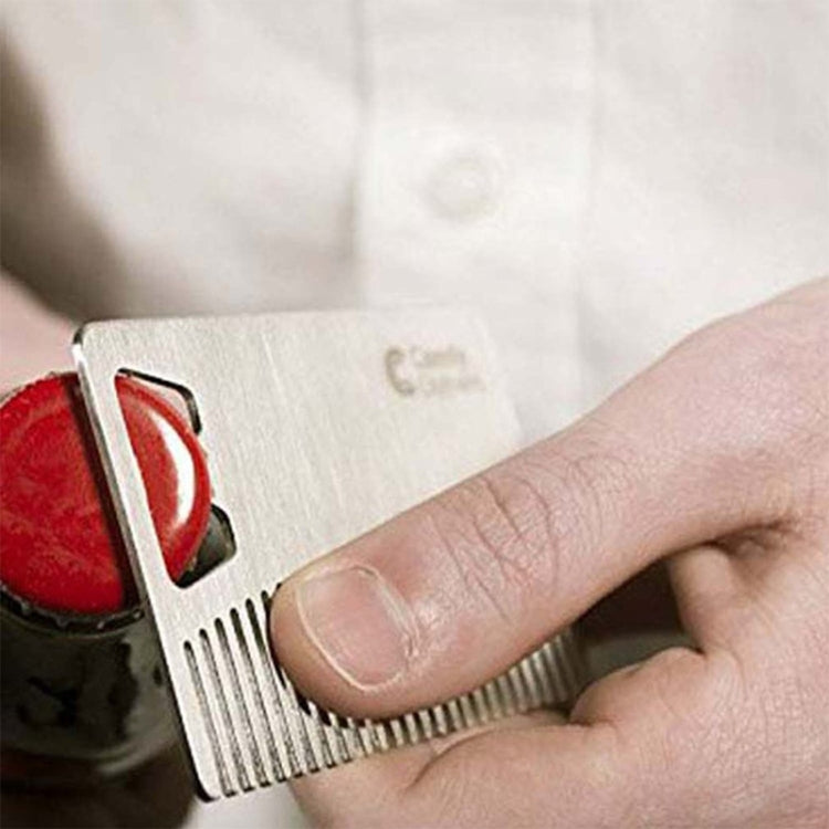 Metal beard comb card with bottle opener end and comb teeth