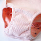 Pink breathable mesh dog pants with stitched leg hole and waistband